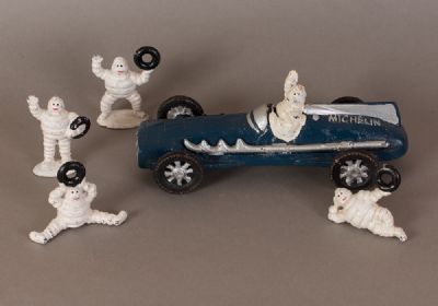 Cast Iron 'Michelin' Car & Michelin Men at Dolan's Art Auction House